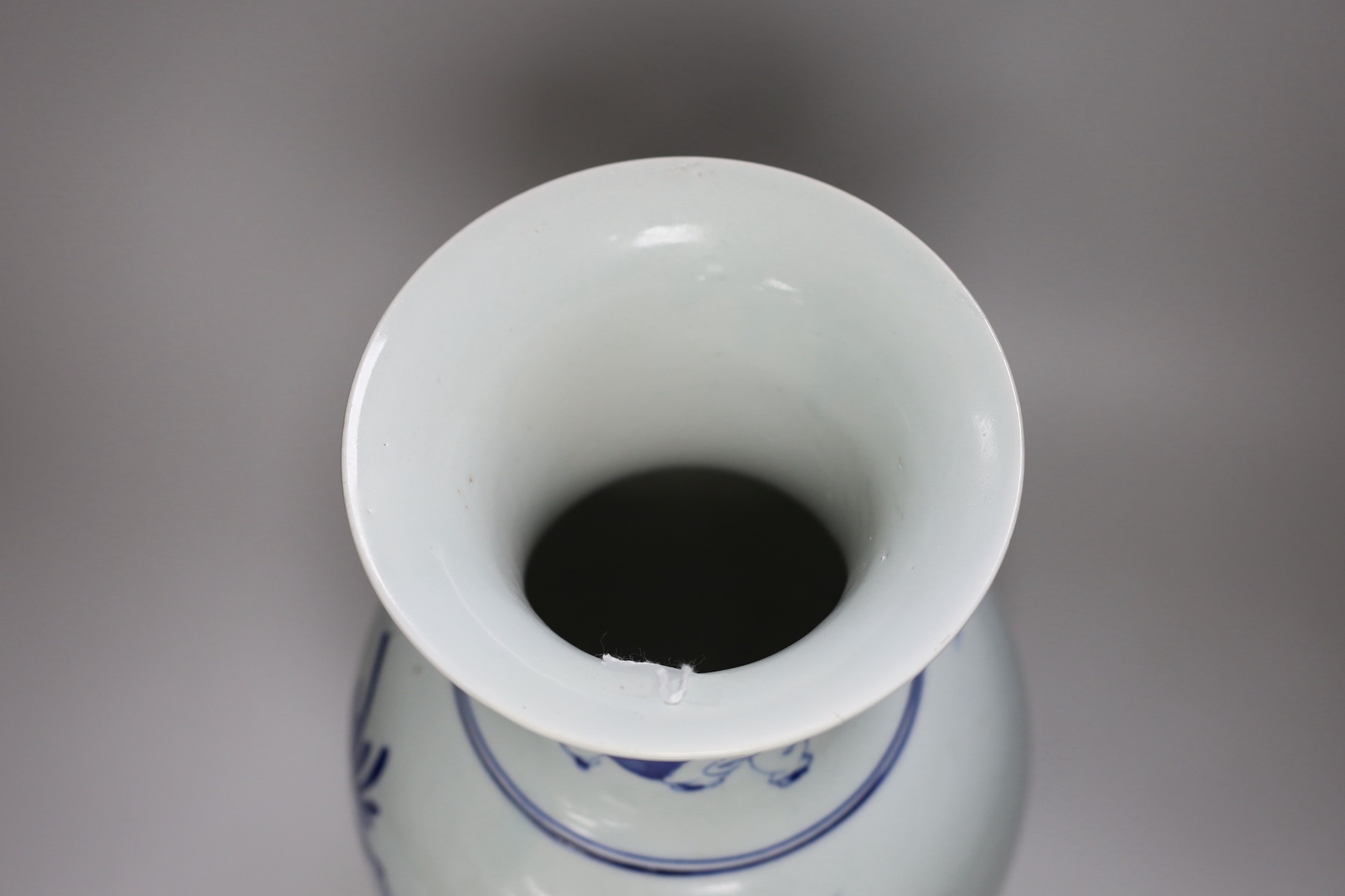 A Chinese blue and white 'scholar's' vase, early 20th century. 37cm high